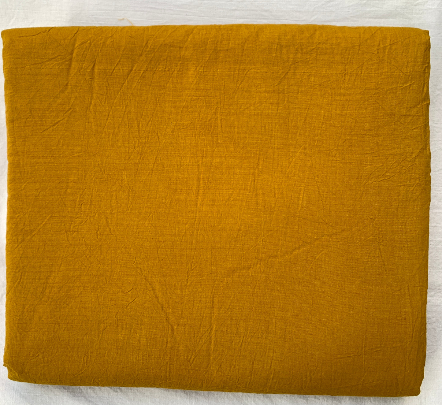 Cotton Plain Turmeric Fabric